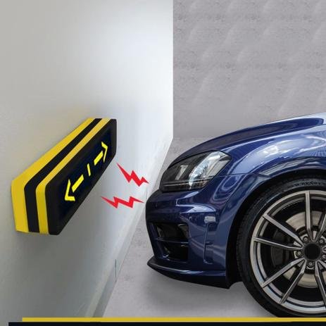 protetor de para-choque na parede com carro se aproximando